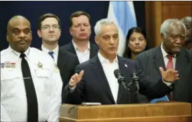  ?? BRIAN CASSELLA / CHICAGO TRIBUNE VIA AP ?? Chicago Mayor Rahm Emanuel, accompanie­d by Police Superinten­dent Eddie Johnson, left, and U.S. Rep. Danny Davis, right, announces a lawsuit against the Trump Justice Department over withholdin­g funding for sanctuary cities at City Hall in Chicago.