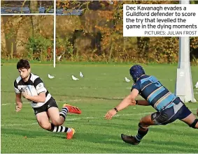  ?? PICTURES: JULIAN FROST ?? Dec Kavanagh evades a Guildford defender to score the try that levelled the game in the dying moments