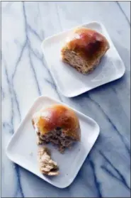  ?? CARL TREMBLAY — AMERICA’S TEST KITCHEN VIA AP ?? This undated photo provided by America’s Test Kitchen in November 2018 shows honey-wheat dinner rolls in Brookline, Mass. This recipe appears in the cookbook “Bread Illustrate­d.”