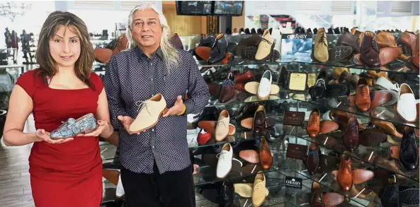  ??  ?? Right price: Alka (right) and Shyam note that pricing is key in maintainin­g competitiv­eness in a niche market such as leather shoes.