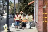  ??  ?? A PSW cleaning crew en route to their next cleaning stop in Portervill­e Tuesday, Sept. 25.