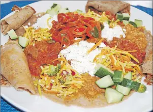  ?? STEPHEN BRUN/THE GUARDIAN ?? Chef Ilona Daniel’s Ethiopian-style beef stew is served with braised red lentils and Injera bread. Daniel came up with her version of the dish following a recent visit to Ethiopia in conjunctio­n with Canada 150 celebratio­ns.