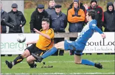  ??  ?? Fort’s Jack Brown is tackled by Albion’s Ross Clarke.