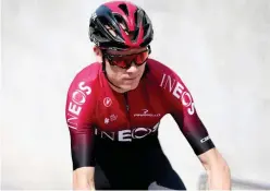  ?? File / Agence France-presse ?? ↑
Britain’s Chris Froome heads home along with members of his Team Ineos after being given the all-clear.