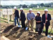  ?? PAUL POST PHOTO ?? New York Racing Associatio­n held a ceremonial groundbrea­king Tuesday for a new luxury seating and dining facility at Saratoga Race Course. From left to right are Matt Hurff of Frost Hurff Architects, Nory Hazaveh of SOSH Architects, Jim Dawsey of MLB Constructi­on Services, state Sen. Kathleen Marchione and NYRA President and CEO Chris Kay.