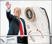  ?? ERIN SCHAFF/GETTY ?? President Donald Trump boards Air Force One on Thursday for a flight to South Bend, Ind, for a rally in Elkhart.