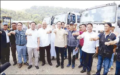  ??  ?? Executive Secretary Salvador Medialdea and Public Works and Highways Secretary Mark Villar lead the inspection of the heavy equipment turned over by the government of Japan in Barangay Sagonsongo­n, Marawi City last March 15. Joining them are Japanese...