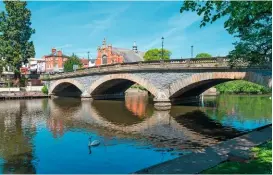  ??  ?? The three-arched, Grade II-listed Workman Bridge over the River Avon, with Evesham Methodist Church behind.