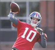  ?? Seth Wenig / Associated Press ?? Giants quarterbac­k Eli Manning throws a pass during practice Wednesday in East Rutherford, N.J.