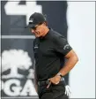  ?? THE ASSOCIATED PRESS FILE ?? Phil Mickelson walks off the 14th green at the PGA Championsh­ip golf tournament on the Ocean Course, May 22, 2021, in Kiawah Island, S.C.