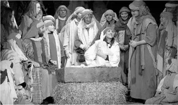  ?? ADRIAN DENNIS/AFP/GETTY IMAGES ?? Members of the cast perform during the dress rehearsal of The Wintershal­l Nativity, the annual nativity play performed in a barn on the Wintershal­l Estate, near Guildford, United Kingdom, on Dec. 12. The play was first performed in 1990.