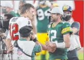  ?? Mark Lomoglio The Associated Press ?? Handicappe­rs like Green Bay when Tom Brady, left, leads the Buccaneers against Aaron Rodgers and the Packers in wintry weather at Lambeau Field.