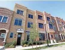  ?? [PHOTO BY PAUL B. SOUTHERLAN­D, THE OKLAHOMAN ARCHIVES] ?? Condos at 422 and 420 NE 2 in 2013, which Kevin Durant converted into one unit, sold for $1.1 million. The property was listed for $1.5 million.