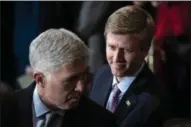  ?? JABIN BOTSFORD/ THE WASHINGTON POST VIA AP, POOL, FILE ?? Nick Ayers, right, listens as Supreme Court Associate Justice Neil Gorsuch waits for the arrival of the casket for former President George H.W. Bush to lie in state at the Capitol on Capitol Hill in Washington on Dec. 3. President Donald Trump’s top pick to replace John Kelly as chief of staff, Nick Ayers, is no longer expected to fill that role, according to a White House official.