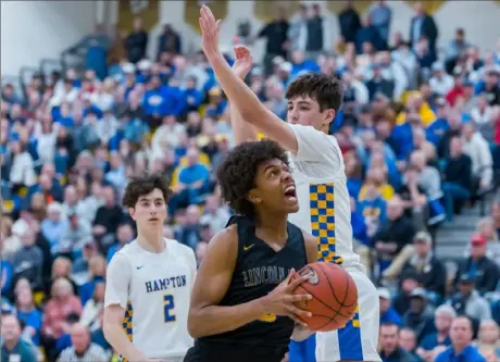  ?? JJ LaBella/For the Post-Gazette ?? Lincoln Park’s Brandin Cummings (3) shoots against Hampton in the PIAA Class 4A semifinal on Monday at North Allegheny High School. View more photos at post-gazette.com.