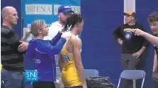  ?? Michael Frankel / SNJToday.com ?? In this image taken from video, high school wrestler Andrew Johnson gets his hair cut after a referee told him he would forfeit his bout if he didn’t have his dreadlocks cut off.