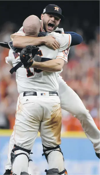  ?? ERIC CHRISTIAN SMITH/THE ASSOCIATED PRESS ?? Houston Astros pitcher Lance McCullers Jr., top, leaps in the arms of catcher Brian McCann after Saturday’s 4-0 Game 7 win over the New York Yankees in Houston.