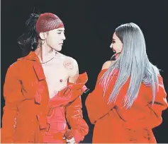  ??  ?? G-Dragon during a live performanc­e with label mate CL.