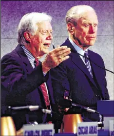  ?? AGENCE FRANCE-PRESSE ?? Former President Jimmy Carter received the 2017 Gerald R. Ford Medal for Distinguis­hed Public Service. They’re shown at a 1997 conference.