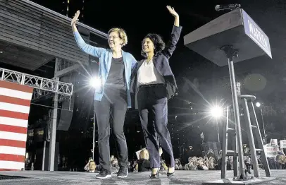  ?? Photos by Elizabeth Conley / Staff photograph­er ?? Democratic presidenti­al candidate Elizabeth Warren, left, and Harris County Judge Lina Hidalgo share the stage during a town hall rally at Discovery Green in Houston on Saturday, two days before Election Day for the primaries on Tuesday.