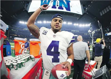  ?? GETTY IMAGES ?? After Sunday’s victory over the New York Giants, Dallas Cowboys quarterbac­k Dak Prescott fielded some lazy questions from reporters.