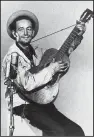  ?? AP ?? Woody Guthrie wrote “This Land Is Your Land” in response to Irving Berlin’s “God Bless America.”