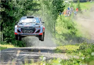  ?? PHOTO: HONZA FRONEK ?? Hayden Paddon and John Kennard launch off one of the many jumps during last year’s Rally Finland.