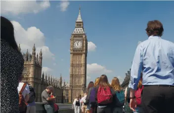  ?? AP FILE FOTO ?? A MOMENT OF SILENCE. In this file photo, people observe a minute of silence in Westminste­r in London, after the suicide attack that left more than 20 people dead and many more injured at the Manchester Arena.