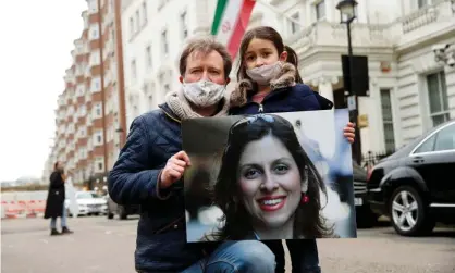  ??  ?? Richard Ratcliffe, husband of Nazanin Zaghari-Ratcliffe, and their daughter Gabriella protest outside the Iranian embassy in London earlier this month. Photograph: Andrew Boyers/Reuters