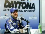  ?? TERRY RENNA — THE ASSOCIATED PRESS ?? Dale Earnhardt Jr. answers questions during a news conference after qualifying for the Sprint Cup Series race was cancelled at Daytona Internatio­nal Speedway on Saturday.