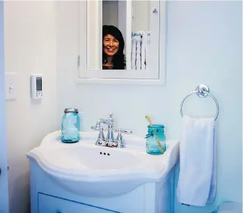  ?? JABIN BOTSFORD/THE ASSOCIATED PRESS ?? A small sink can help make the bathroom space look bigger.