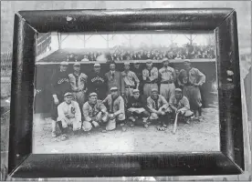  ?? COURTESY OF SACO RIVER AUCTIONS VIA AP ?? This image provided by Saco River Auctions in Biddeford, Maine, shows a photograph that belonged to baseball player Harry Lord. The 1910 photograph shows a group of American League All-Stars, including Ty Cobb, front row, far left, prior to a game at Shibe Park in Philadelph­ia. It will be sold at an upcoming auction in Biddeford.