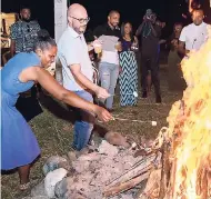  ??  ?? The beautiful bonfire became a nice highlight, blazing the night with the added indulgence of marshmallo­ws.