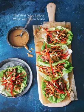  ??  ?? Thai Steak Salad Lettuce Wraps with Peanut Sauce