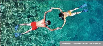 ??  ?? the maldives’ clear water is perfect for snorkellin­g