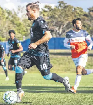  ?? HFX WANDERERS ?? HFX Wanderers forward Alessandro Riggi, who spent two years recuperati­ng from an ACL injury, dribbles the ball during a match against Forge FC at the Island Games in P.E.I. last summer.