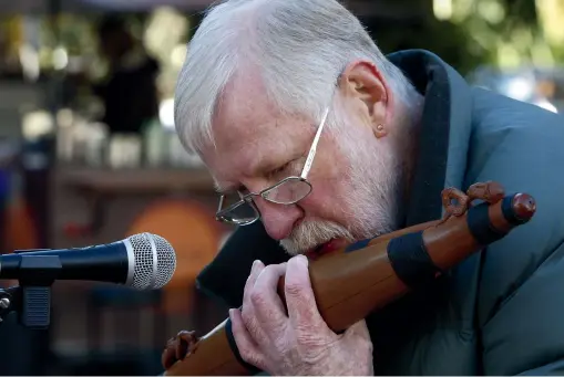  ??  ?? Richard Nunns performing in 2009, and at his home in Nelson. With singer-composer Hirini Melbourne, and instrument maker Brian Flintoff, he led the revival in taonga pu¯ oro.