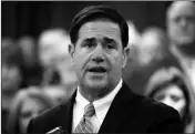  ?? ASSOCIATED PRESS ?? ARIZONA GOV. DOUG DUCEY speaks prior to signing the order calling the Legislatur­e into a special session Jan. 22 at the Capitol in Phoenix.