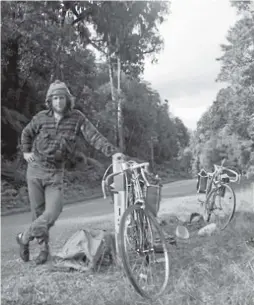  ??  ?? Alastair Smith crossing Arthur’s Pass on his first long-distance cycle tour in 1974; top, campaignin­g against the height of kerbs in 2015; and with partner Margaret Powell.