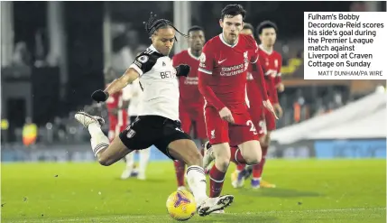  ?? MATT DUNHAM/PA WIRE ?? Fulham’s Bobby Decordova-Reid scores his side’s goal during the Premier League match against Liverpool at Craven Cottage on Sunday