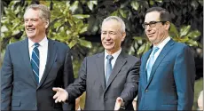  ?? JOSE LUIS MAGANA/AP ?? Chinese Vice Premier Liu He, center, with Robert Lighthizer, left, and Steven Mnuchin, greets the news media before trade meetings in Washington on Thursday.