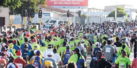 ?? PICTURE: AYANDA NDAMANE ?? Thousands of runners took to the streets to celebrate the Day of Reconcilia­tion in the annual RCS Gugs Reconcilia­tion Race yesterday. The Cape Times is the media partner to the race.