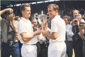  ??  ?? Opening shot: John Newcombe (right) and Wilhelm Bungert after the 1967 final