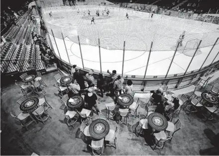  ?? STEVE EARLEY/STAFF FILE ?? A sparse crowd watches the Admirals play the Swamp Rabbits last season. The canceled season gives the team a chance to focus on the business side.