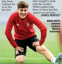  ??  ?? RED-HOT: James enjoys Wales training