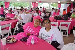  ?? Photo courtesy of Kate Snow ?? Rowenia Cheatham and Yolanda Nolen enjoy the Survivors Breakfast before the beginning of Saturday’s Race for the Cure.