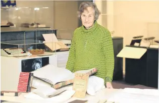  ?? PHOTOS: HAMISH MACLEAN ?? Treasure trove . . . For years Kathleen Perry stored what she knew to be family history at home. She later learned the records were a complete history of the Oamaru Totara Tree Stone Company and offered new insight into the workings of one of Oamaru’s...