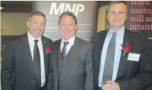  ??  ?? Award recipient Sheldon Kennedy, left, poses with MNP’s Randy Mowat and award recipient Horizon North Logistics’ Rod Graham.