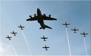  ?? — Bernama ?? Sky high: Royal Malaysian Air Force personnel performing an airshow during the launch of Lima.