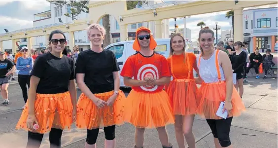  ?? ?? Participan­ts dress up in orange for the Multiple Steps for Multiple Sclerosis event.